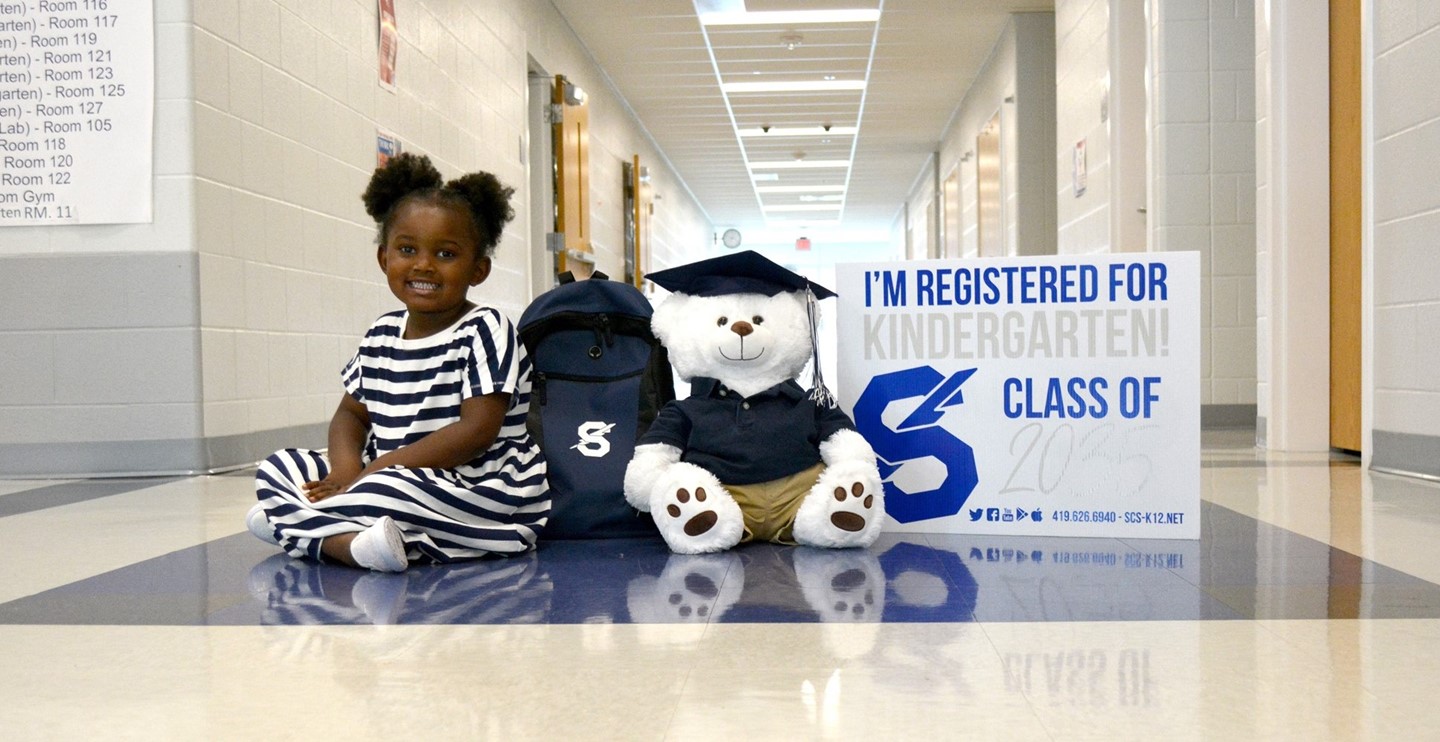 KG Registration Child with Bookbag and bear
