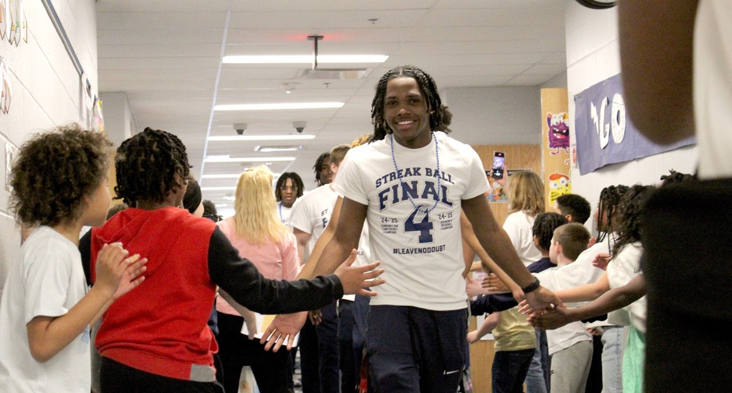 The Varsity Boys Basketball Team Visits Sandusky Intermediate