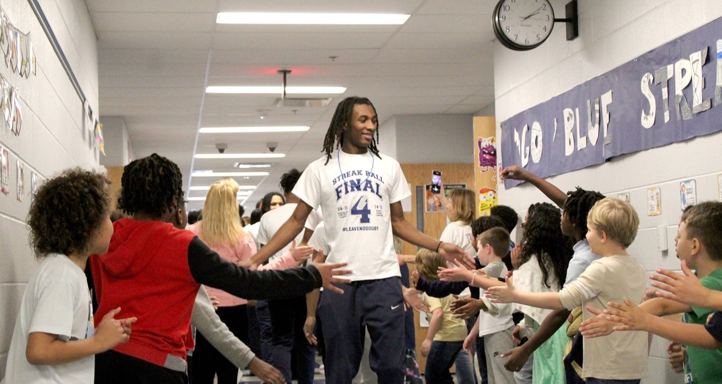 The Varsity Boys Basketball Team Visits Sandusky Intermediate